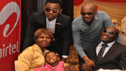 Airtel Smart Icons, Patrick Okorie a.k.a ‘Patoranking’ and Tuface Idibia with Airtel Touching Lives Season 1 beneficiary, Mr. Essienkan Ebong and his family, during the launch of Airtel Touching Lives Season 2 held in Ikoyi, Lagos on Wednesday.